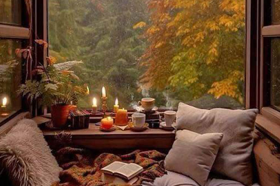 Rilassati con un libro in autunno piovoso