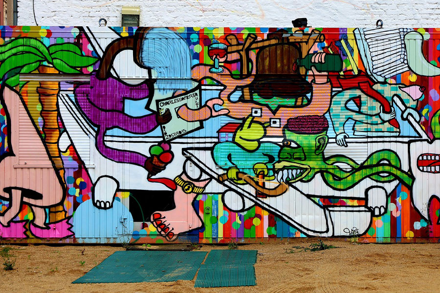 Mural colorido que recuerda al artista Snars.