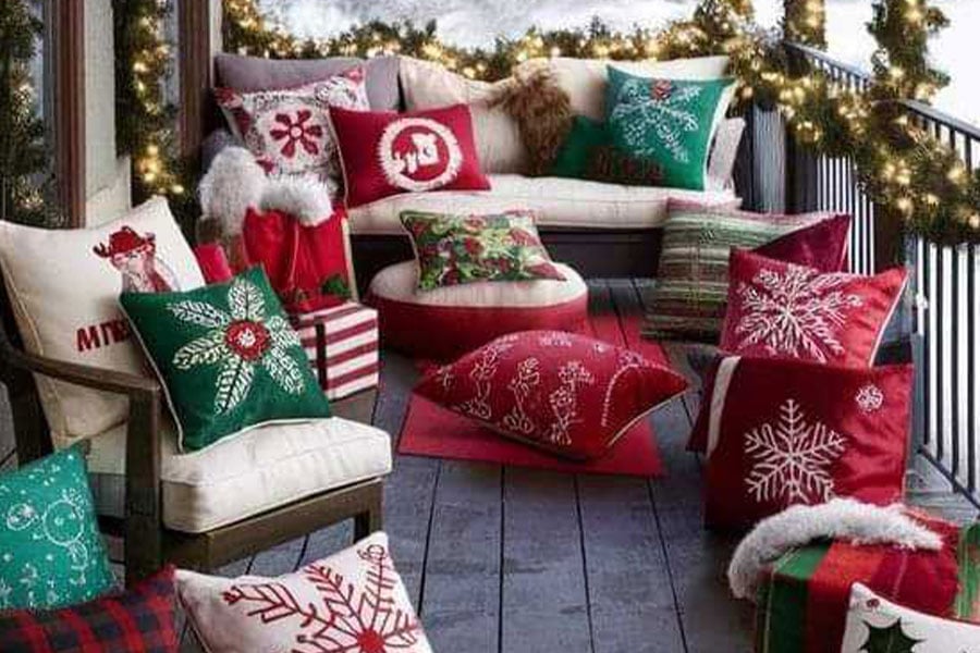 Porch with decorative Christmas cushions