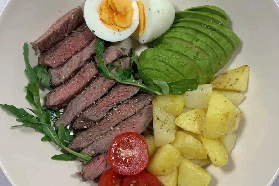 Steak salad with eggs and potatoes