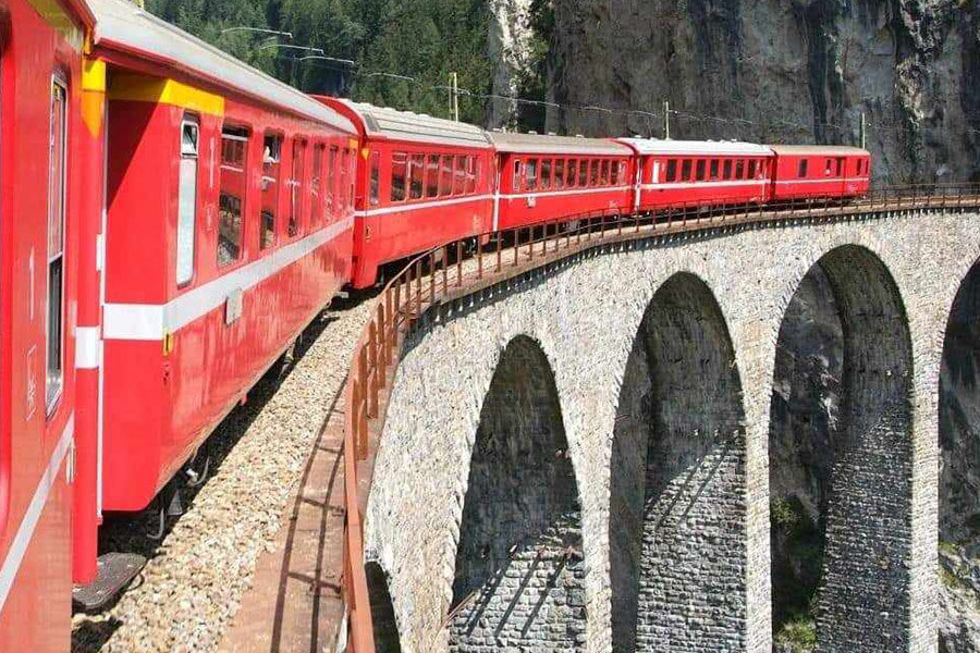 Landwasser viaduct in Switzerland red train