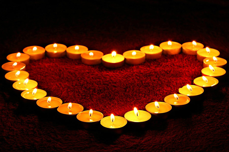 Candles light heart shape