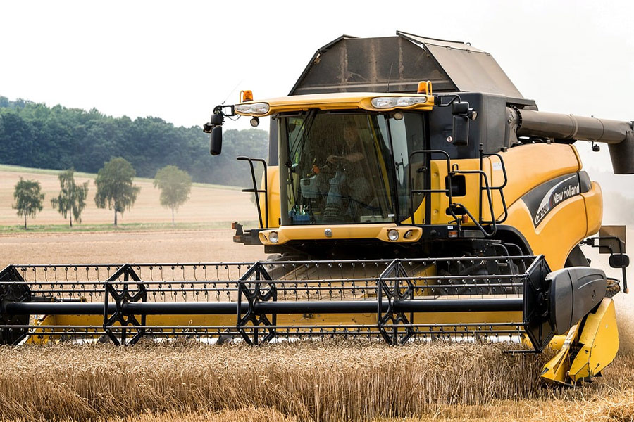 Combine harvester machine color yellow